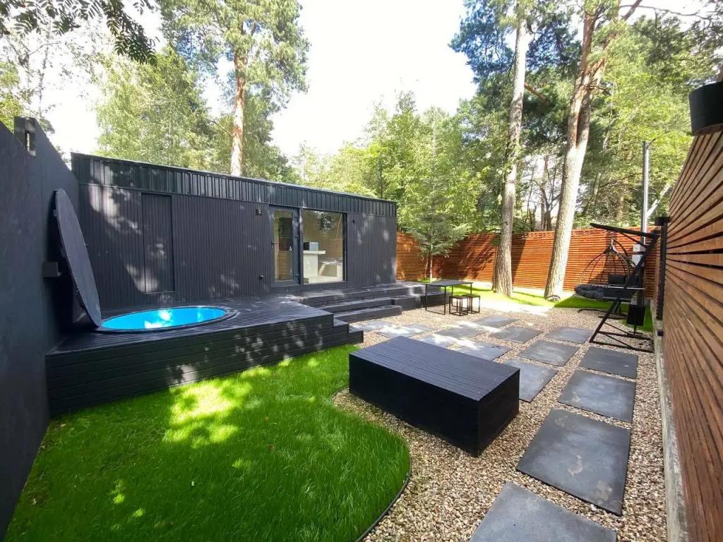 Частный дом Домик для Отдыха Вдвоем, с Сауной, Купелью, Мангалом и дизайнерской территорией - главное фото