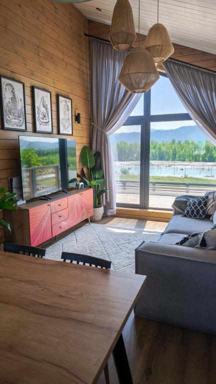 Частный дом Современный гостевой дом на слиянии рек Катунь и Кокса - главное фото